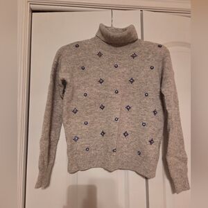 Gray Turtleneck Sweater with Blue Accents